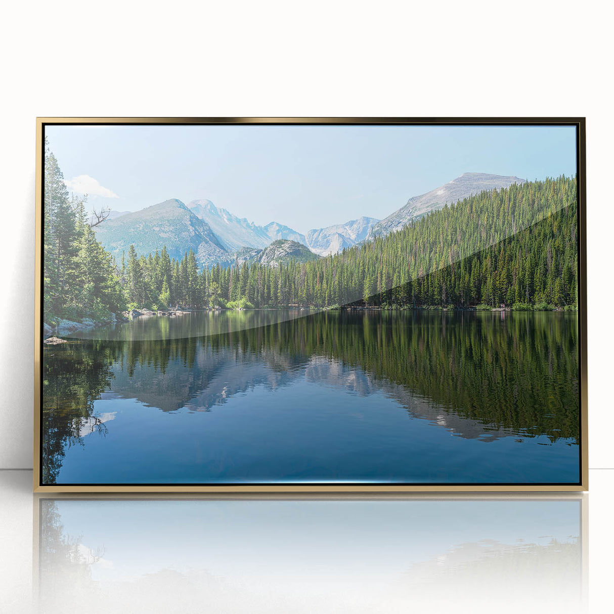 Acrylic print of Colorado Springs scenery in gold frame, featuring mid-century modernist style.