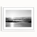 Abstract art print of Delaware scenery in muted blue and green tones on a white framed canvas, ideal for dining room decor.