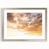 Textured abstract art print of the Everglades in muted green and blue tones, framed with a silver mat, ideal for bedroom art.