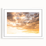 Abstract art print of the Everglades in muted green and blue tones, framed in white.