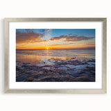 Textured art print of abstract Florida Keys scenery in muted blue and green tones, framed in silver.