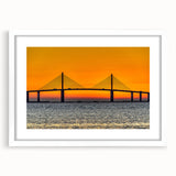 Abstract art print of Tampa skyline in muted gray and blue tones on a framed white mat, ideal for dining room decor.