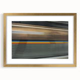 Extra large wall art featuring an abstract Atlanta skyline in muted gold and gray tones on a framed canvas.