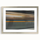 Textured abstract art print of Atlanta skyline in muted gray tones on a framed silver mat, suitable for bedroom decor.