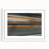 Abstract art print of Atlanta skyline in muted gray and blue tones on a framed canvas, suitable for dining room decor.