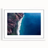 Abstract art print of Kauai, Hawaii scenery in muted green and blue tones on a framed canvas.