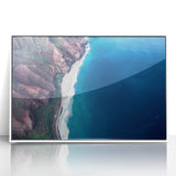 Acrylic print of Kauai landscape with lush greenery and ocean view, framed in white, suitable for modern art wall decor.