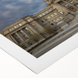 Art deco poster featuring a serene Idaho landscape in muted green and blue tones, printed on rolled canvas.