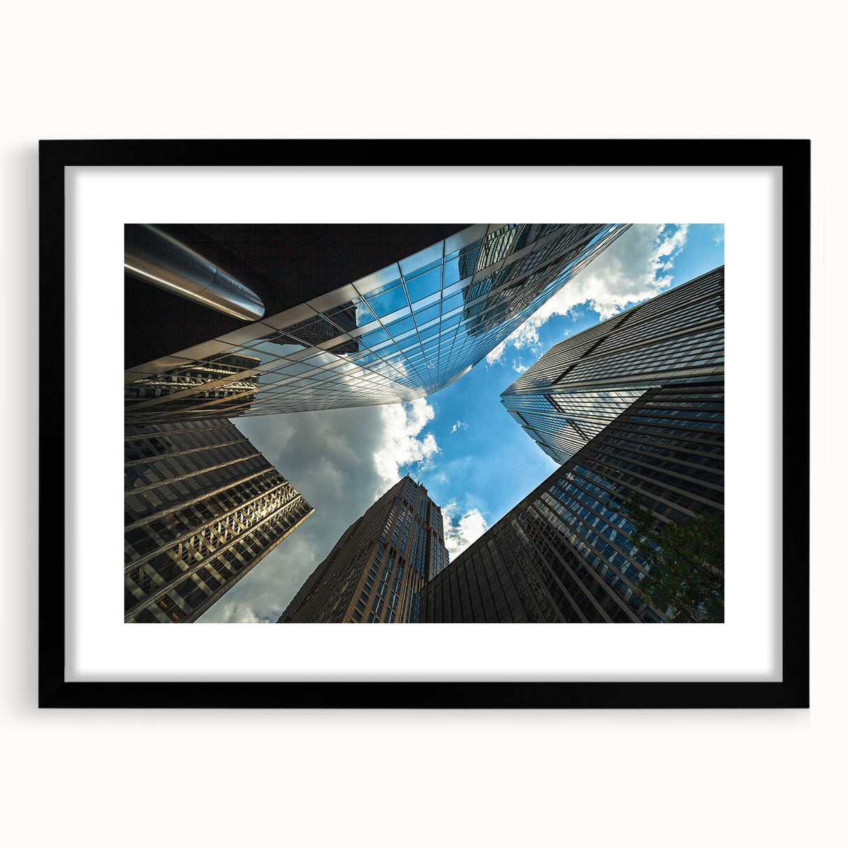 Extra large abstract art print of colorful Chicago skyline with textured details on a black framed canvas.