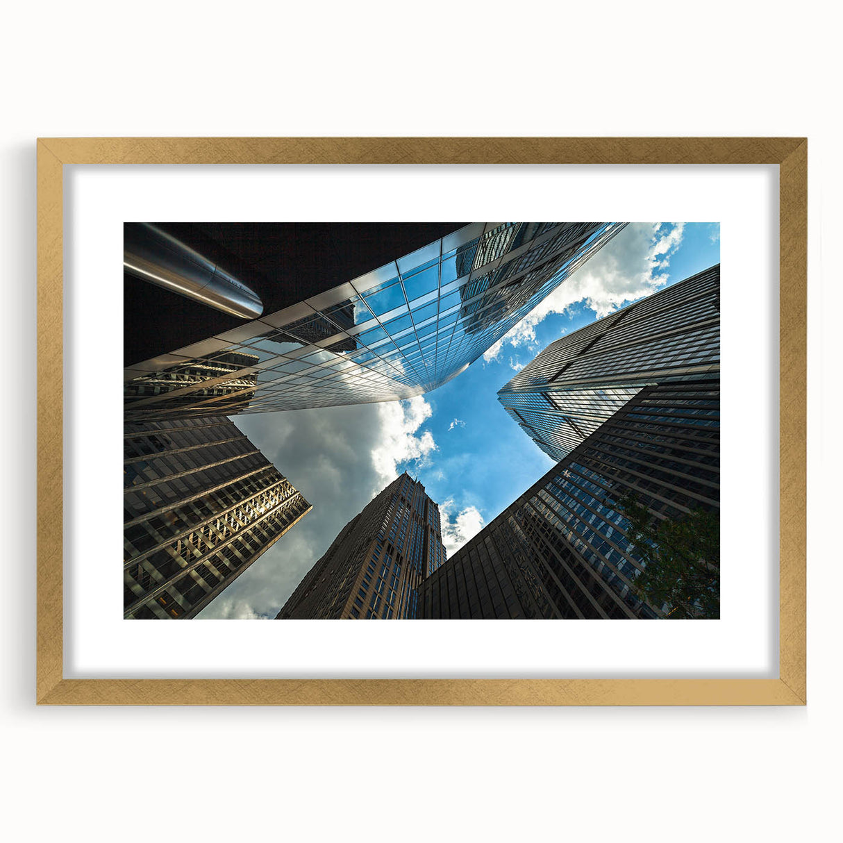 Extra large textured abstract art print of Chicago skyline in muted gold and blue tones on a framed canvas.