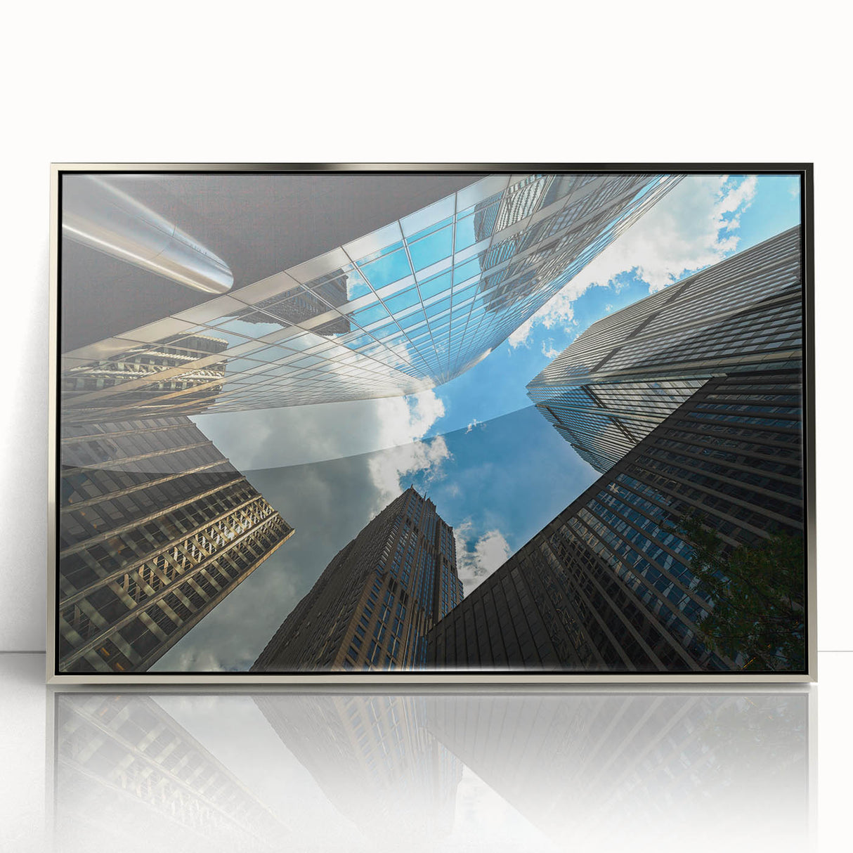 Mid-century modernist art depicting the Chicago skyline in muted silver and blue tones on a framed acrylic print.
