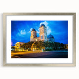 Textured art print of abstract Louisiana scenery in muted earth tones, displayed in a silver frame.