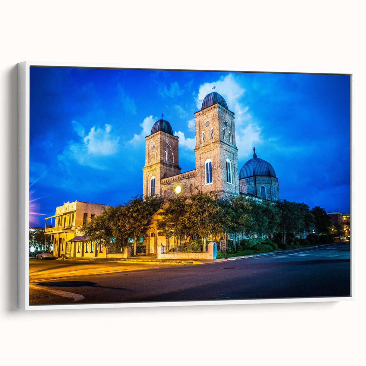 Vintage poster art of Louisiana scenery on a framed canvas, featuring colorful art in a black and white side view.