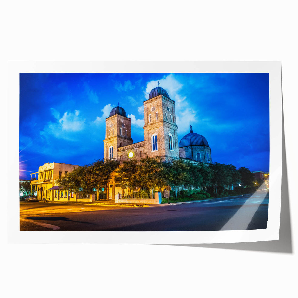 Rolled print of a Louisiana landscape with vivid green tones and floral elements, suitable for art wall dining room.
