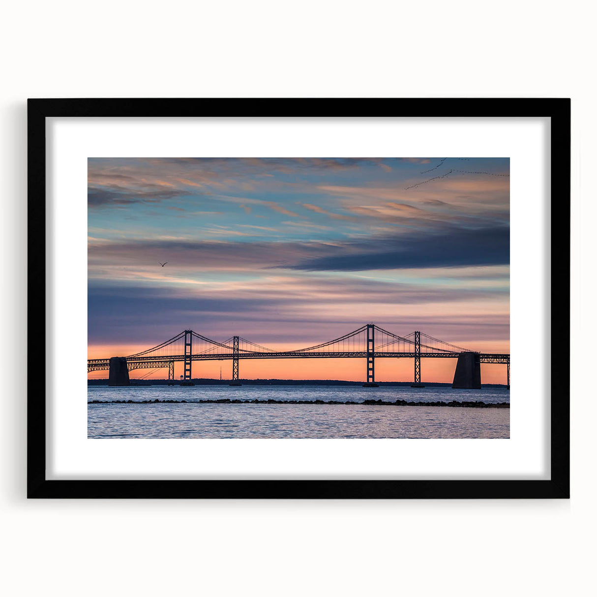 Abstract art print of Baltimore skyline in vibrant colors on a large framed canvas, suitable for living room decor.