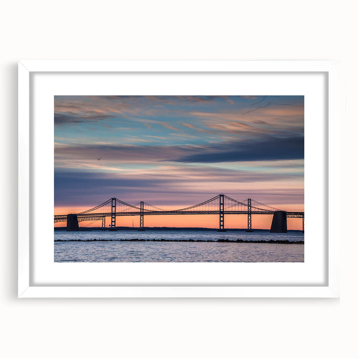 Abstract art print of Baltimore skyline in muted gray and blue tones, framed with a white mat.