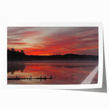 Scenic Michigan Upper Peninsula landscape on a rolled print, featuring lush greenery with soft blue sky.