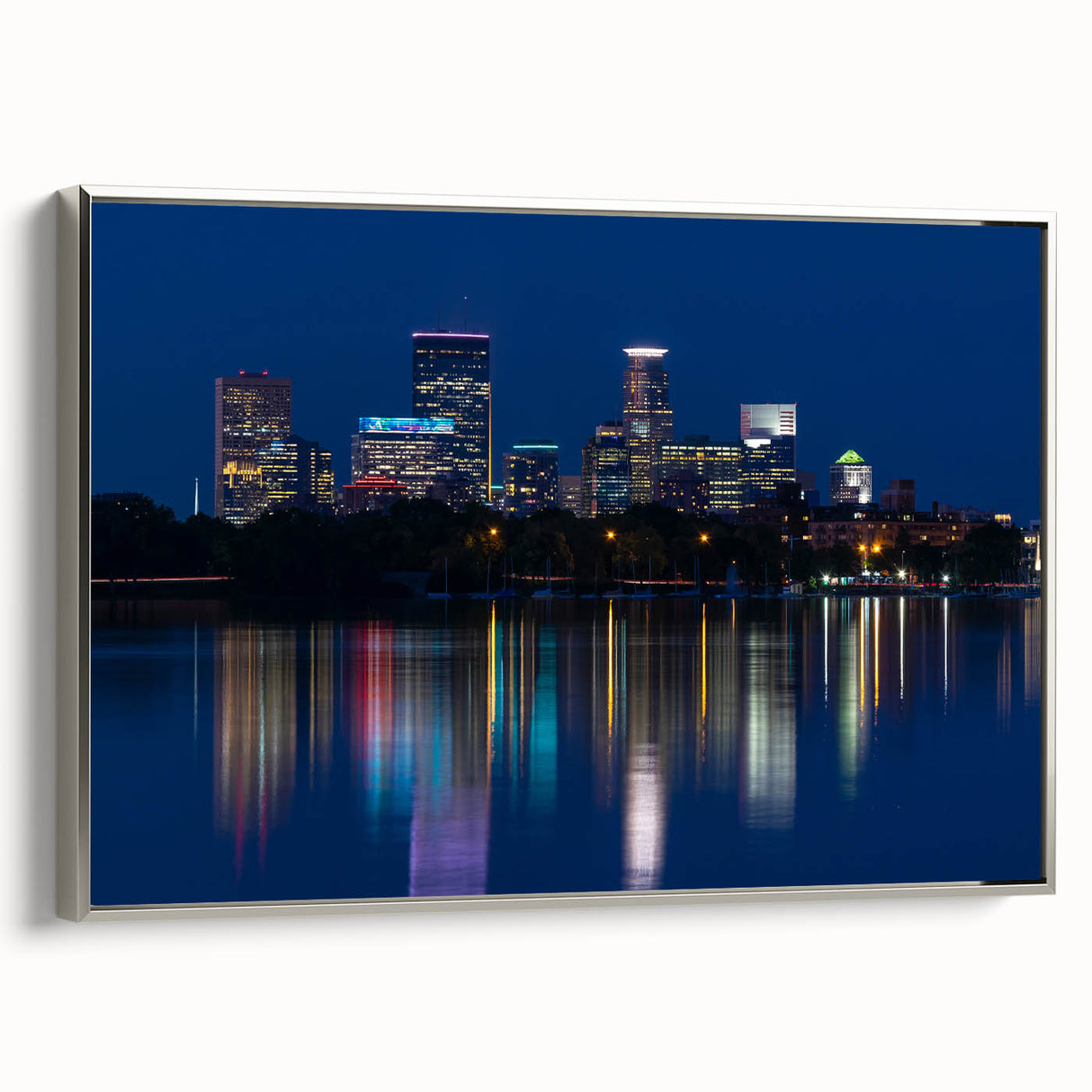 Framed canvas depicting a vintage-style Minneapolis landscape in colorful art tones.