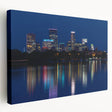 Side view of a stretched canvas featuring the Minneapolis skyline in muted blue and gray tones.