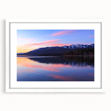 Abstract art print of Montana scenery in muted earth tones on a white-framed mat, suitable for bedroom or dining room decor.