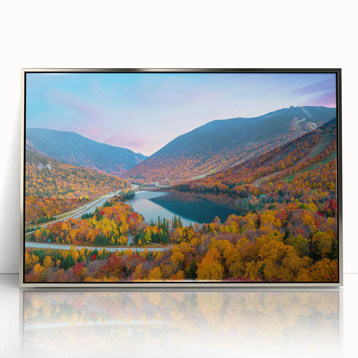 Mid-century modernist art depicting New Hampshire scenery in muted earth tones on a silver-framed acrylic print.