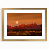 Extra large textured abstract art print of a New Mexico scenery in gold frame, suitable for living room decor.