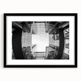 Extra large abstract art print of Charlotte skyline in colorful, textured style on a black framed canvas.