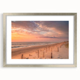 Textured art print of abstract Outer Banks scenery in muted blue and gray tones on a framed canvas.