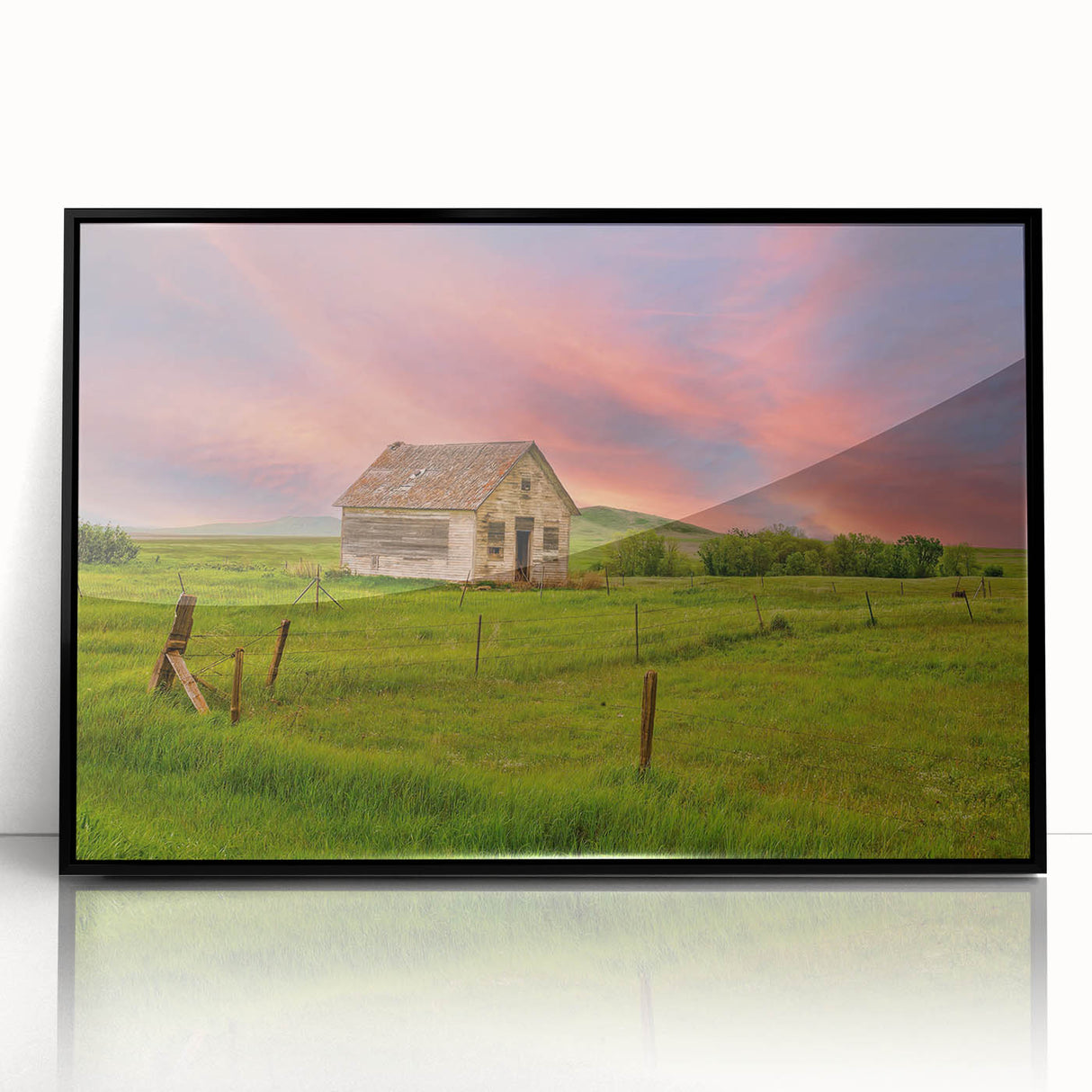 Large abstract wall art depicting North Dakota scenery in muted earth tones, framed in black acrylic.