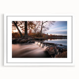 Abstract art print of Long Island scenery in muted blue and green tones on a framed white mat, ideal for dining room decor.