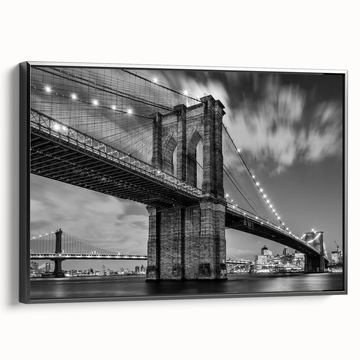Black and white framed canvas of the Brooklyn Bridge, ideal for bedroom wall art.