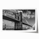 Rolled print of the Brooklyn Bridge with muted gray and blue tones, ideal for dining room wall art.