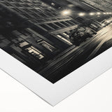 Art deco poster of the Empire State Building in monochrome tones on a rolled canvas, suitable for dining room decor.
