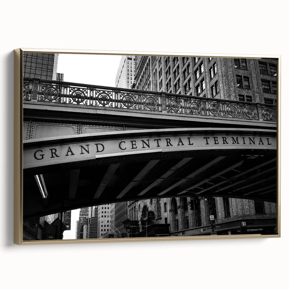 Framed canvas of vintage New York City Grand Central Station in black and gold tones, suitable for bedroom wall art.