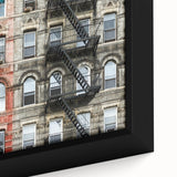 Extra large framed canvas featuring a textured depiction of the Manhattan skyline in black with colorful accents.