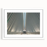 Abstract art print of NYC's Trade Center in muted gray tones on a framed white mat, suitable for dining room decor.