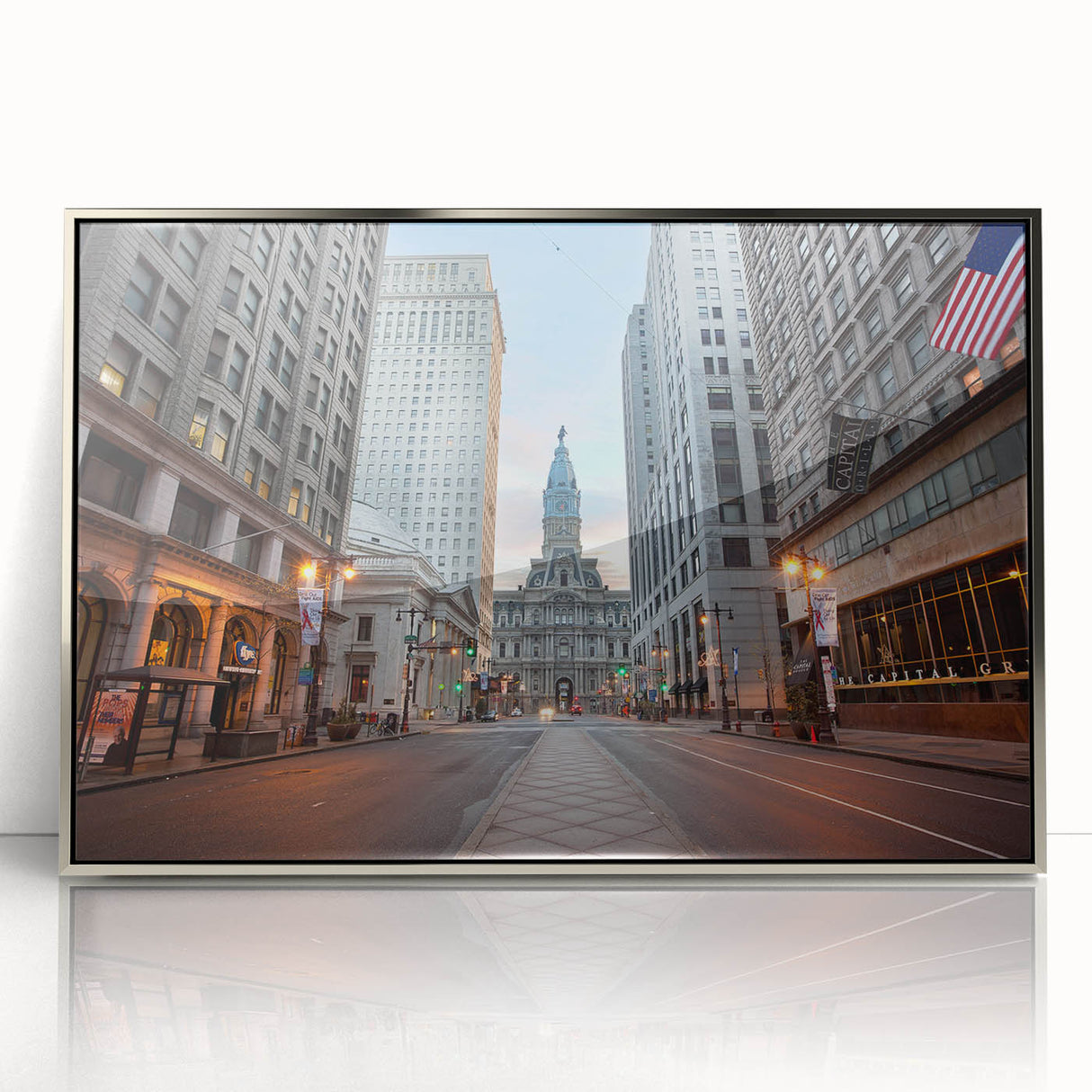 Mid-century modernist art of Philadelphia skyline in muted blues and grays on a silver-framed acrylic.