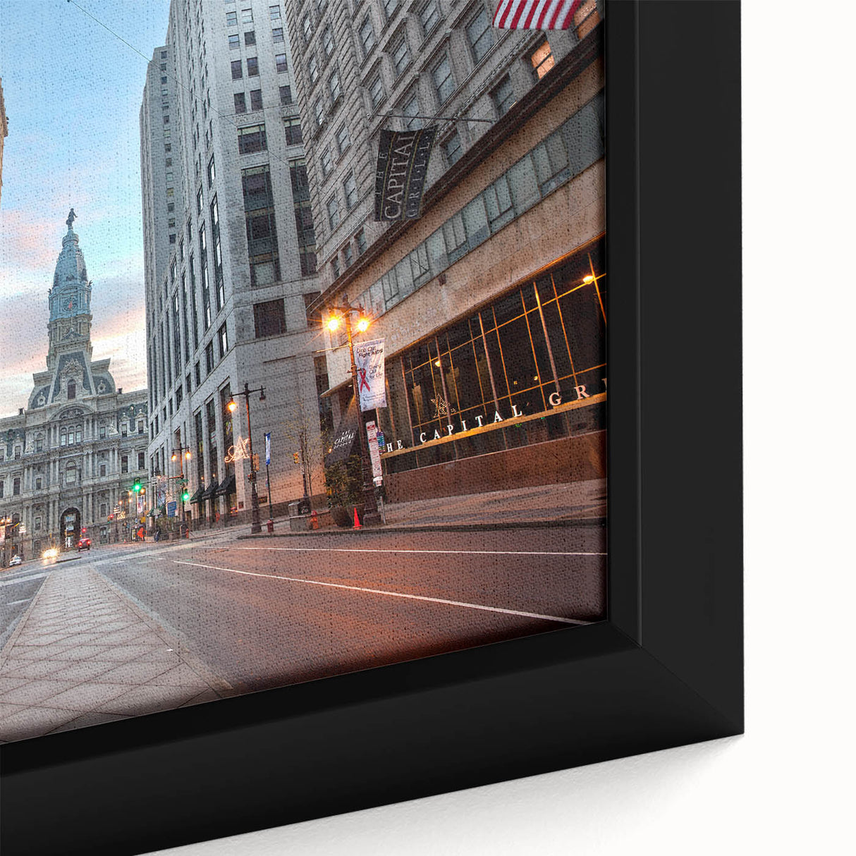 Framed canvas of Philadelphia skyline in textured black with colorful accents, ideal for living room decor.