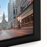 Framed canvas of Philadelphia skyline in textured black with colorful accents, ideal for living room decor.
