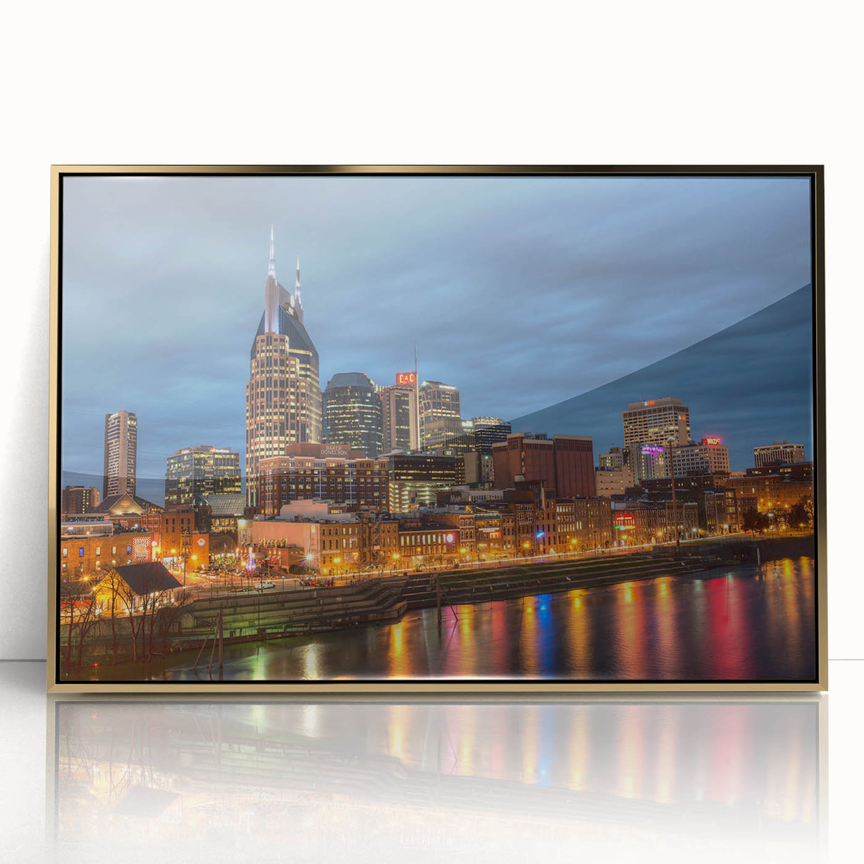 Framed acrylic print of Nashville skyline in gold and black tones, ideal for modern art wall decor.
