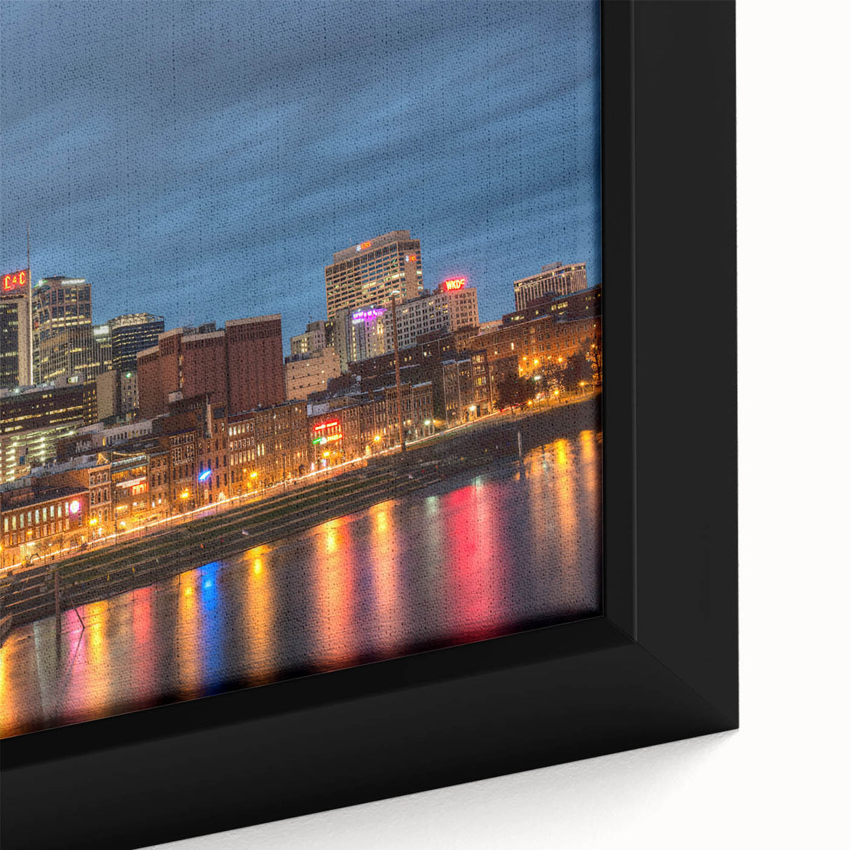 Framed canvas of Nashville skyline in textured black with vibrant colorful accents, suited for large living room walls.