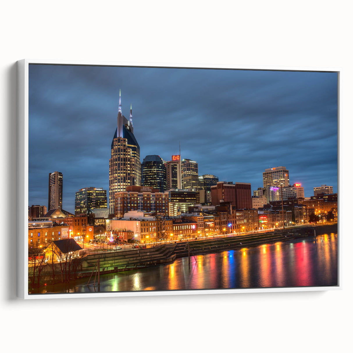 Vintage poster art of Nashville skyline in colorful tones on a large framed canvas, ideal for living room decor.