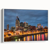 Vintage poster art of Nashville skyline in colorful tones on a large framed canvas, ideal for living room decor.