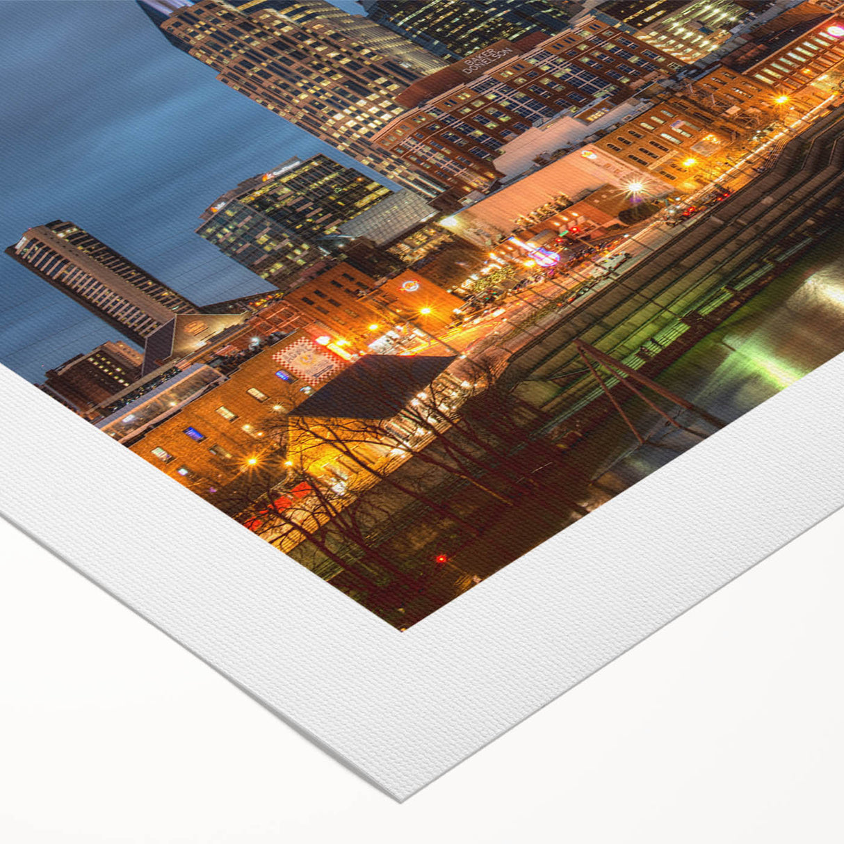 Art deco poster of Nashville skyline in muted gold and blue tones on rolled canvas, suitable for dining room wall art.