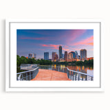 Abstract art print of Austin skyline in muted blue and white tones on a framed canvas, suitable for dining room decor.