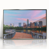 Mid-century modernist art depicting Austin, Texas skyline in muted earth tones on a silver-framed acrylic print.