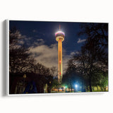 Vintage poster art of San Antonio skyline on extra large framed canvas, featuring colorful art against a black background.