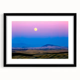 Extra large abstract art print of colorful, textured Palouse scenery on a black framed canvas, ideal for living room decor.