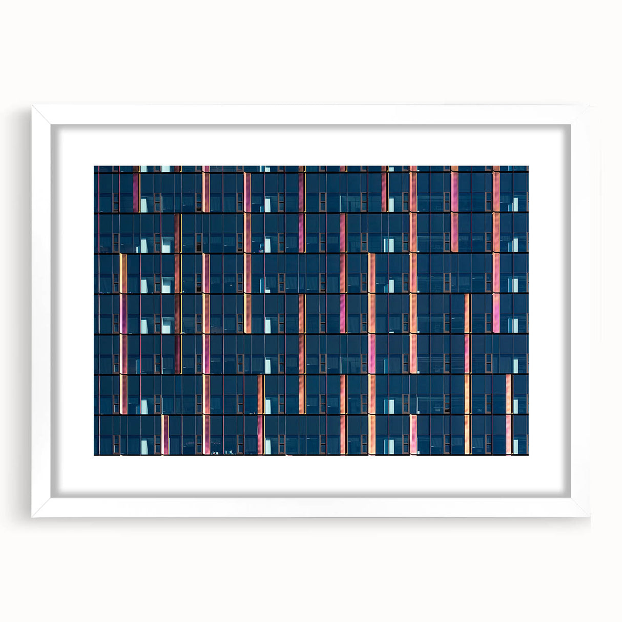 Abstract art print of Seattle skyline in muted gray and blue tones on a framed white canvas.