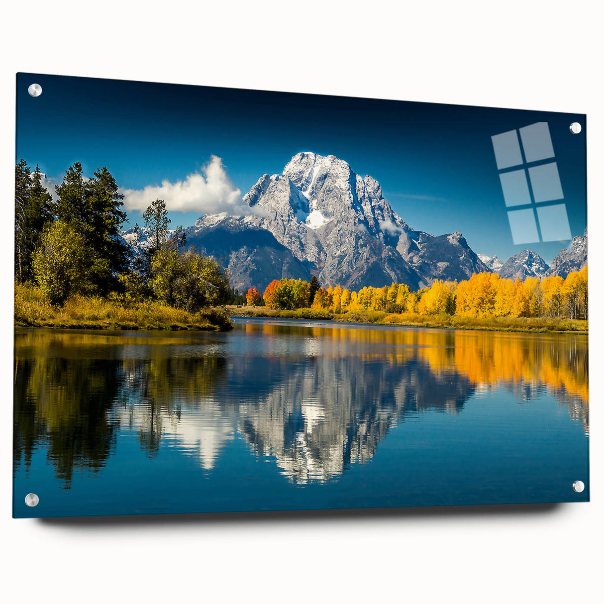 Acrylic print of the Grand Tetons with a reflective finish, showcasing earth tones, ideal for dining room or bedroom decor.